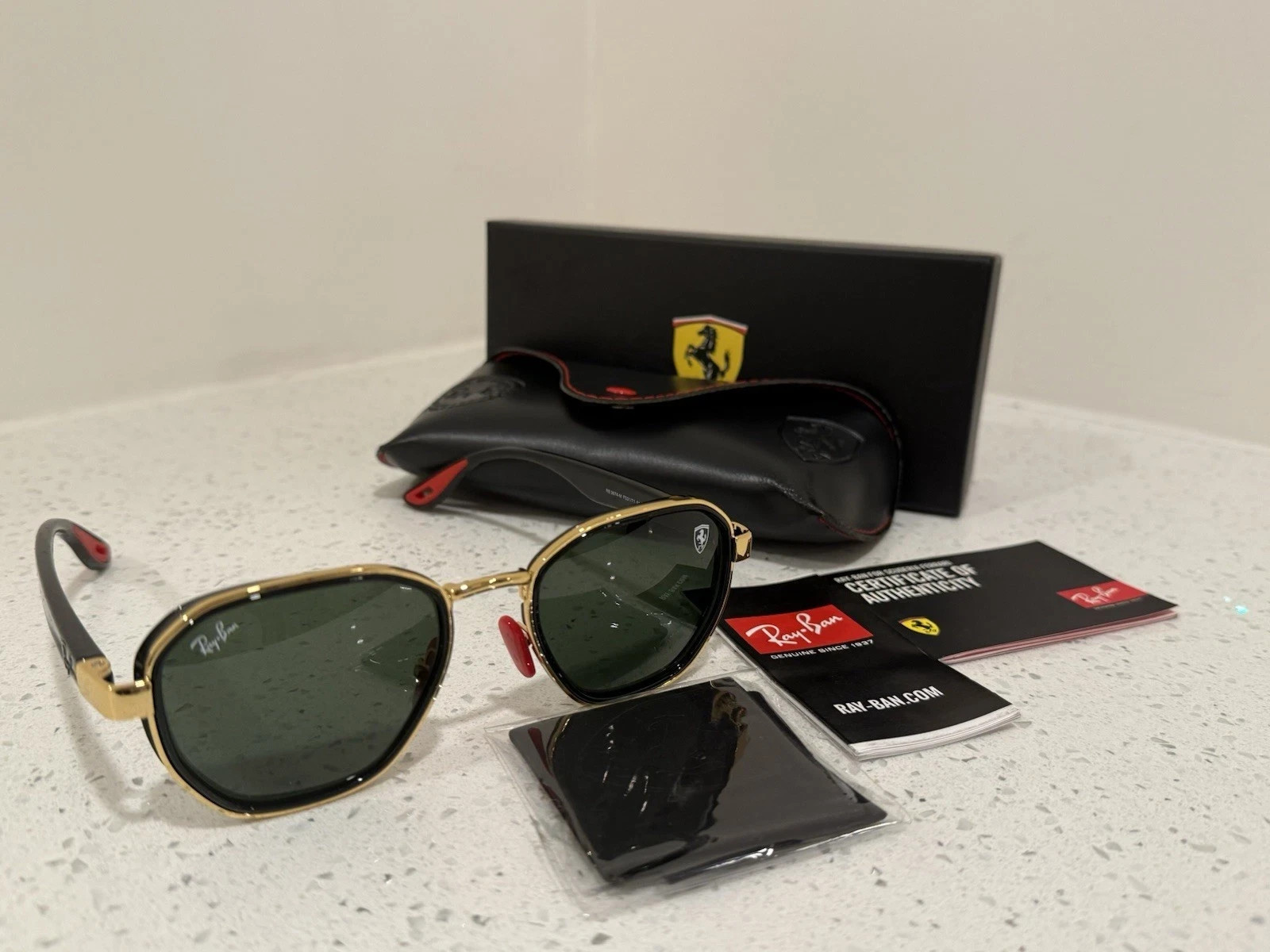 عینک آفتابی مشکی طلایی ریبن فراری مدل 🇮🇹RayBan RB3674-M Ferrari