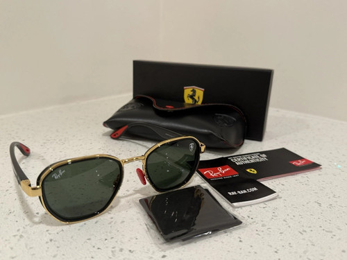 عینک آفتابی مشکی طلایی ریبن فراری مدل 🇮🇹RayBan RB3674-M Ferrari